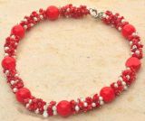 Жемчужное ожерелье с красными кораллами