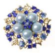 Кольцо с жемчугом и австрийскими кристаллами синего сапфира (в виде цветка)